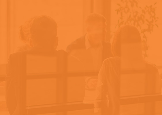 People behind orange background