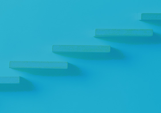 White wooden blocks behind blue background